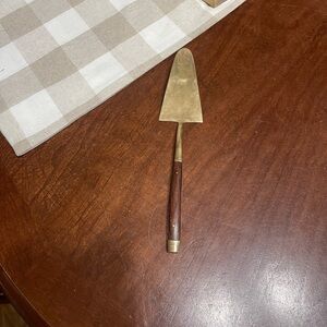 Mcm rosewood brass cake server